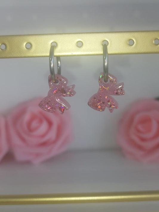 Nœuds roses pailletés