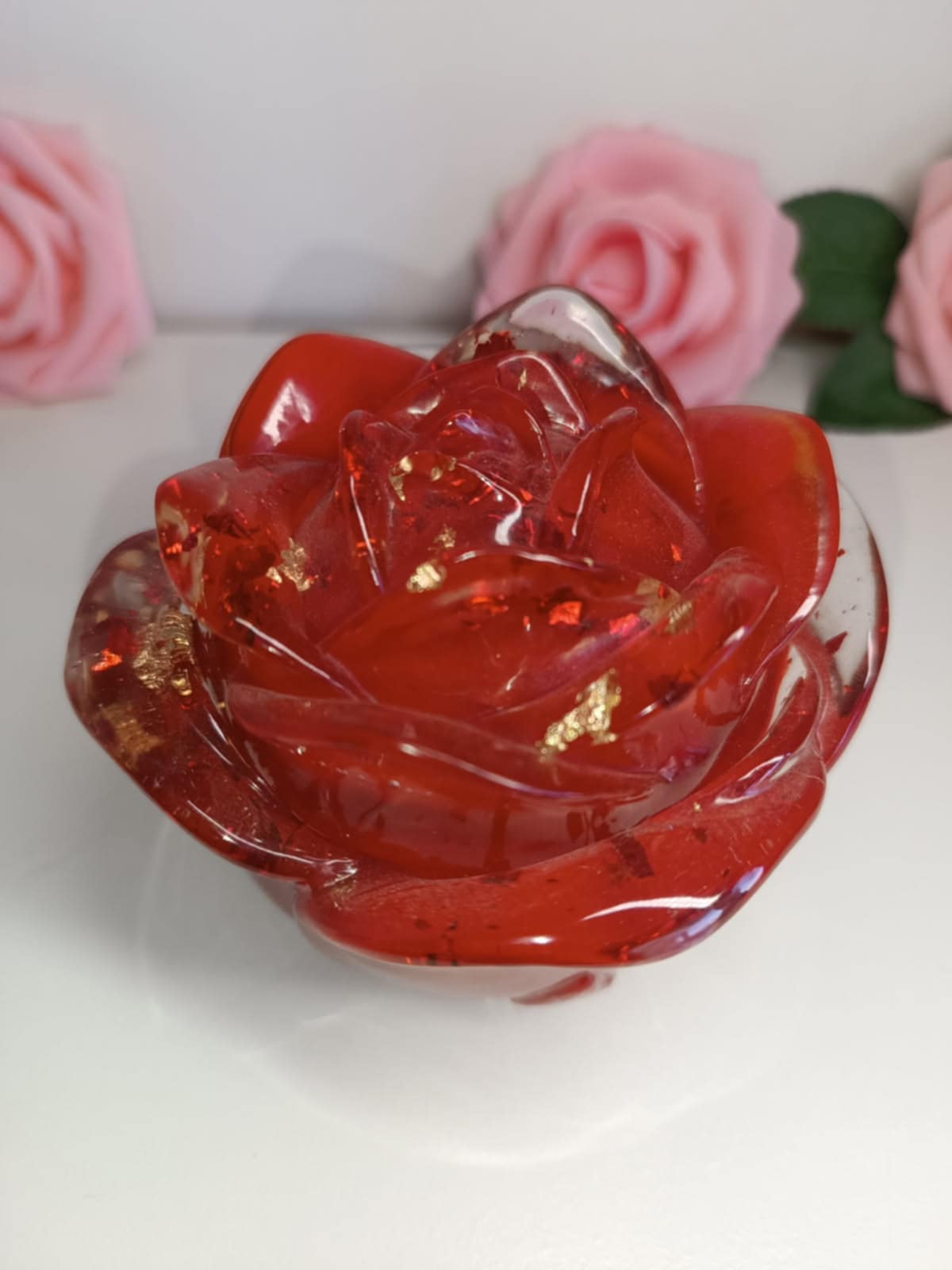Boîte rose à bijoux rouge et feuilles d'or