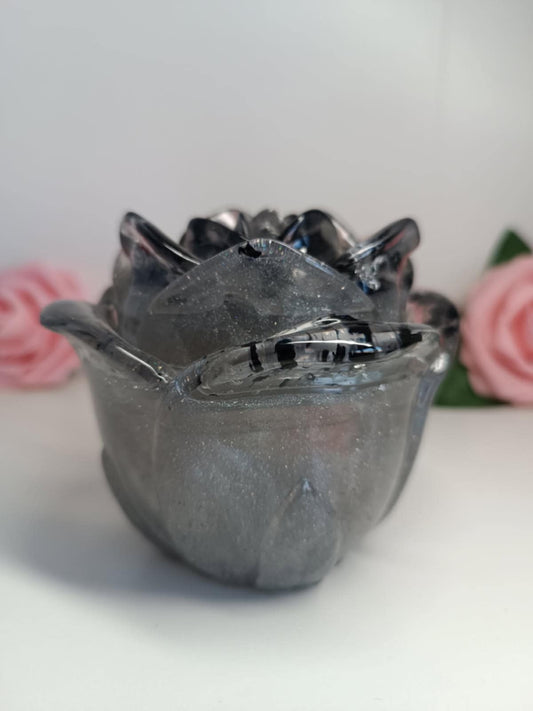 Boîte rose à bijoux grise et feuilles noires